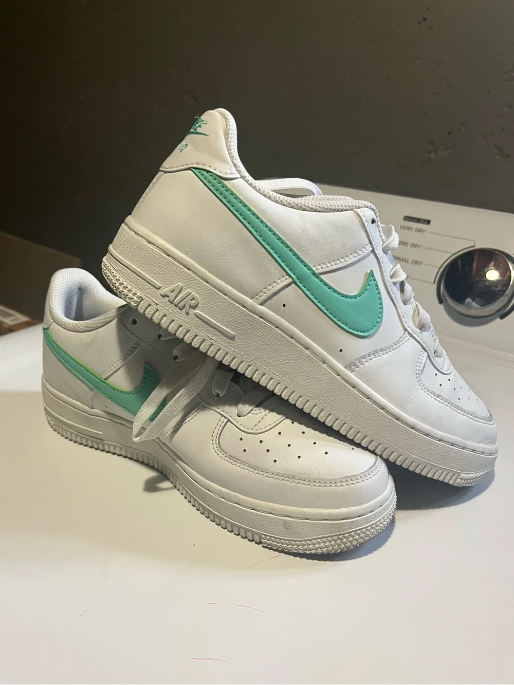 Nike White Sneakers with Light Green Swoosh Accent